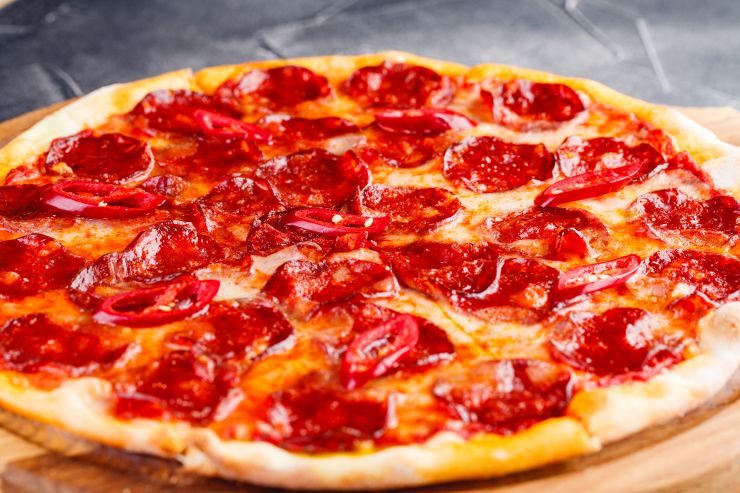 pepperoni-pizza-on-wooden-board-on-dark-background-2021-08-29-08-19-00-utc.jpg