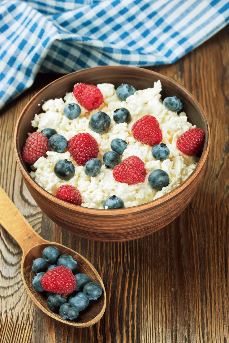 cottage-cheese-with-berries-on-brown-wooden-backgr-2022-02-19-02-38-55-utc.jpg