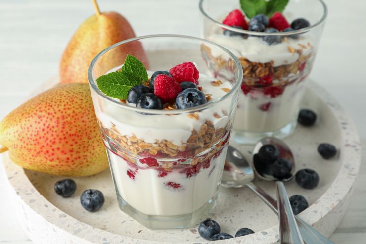 parfaits-and-pears-on-white-wooden-table-space-fo-2021-09-02-15-14-17-utc.jpg