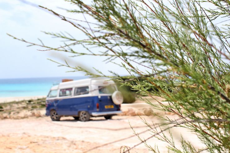 camper-van-parked-by-a-beach-2021-09-01-13-45-47-utc.jpg