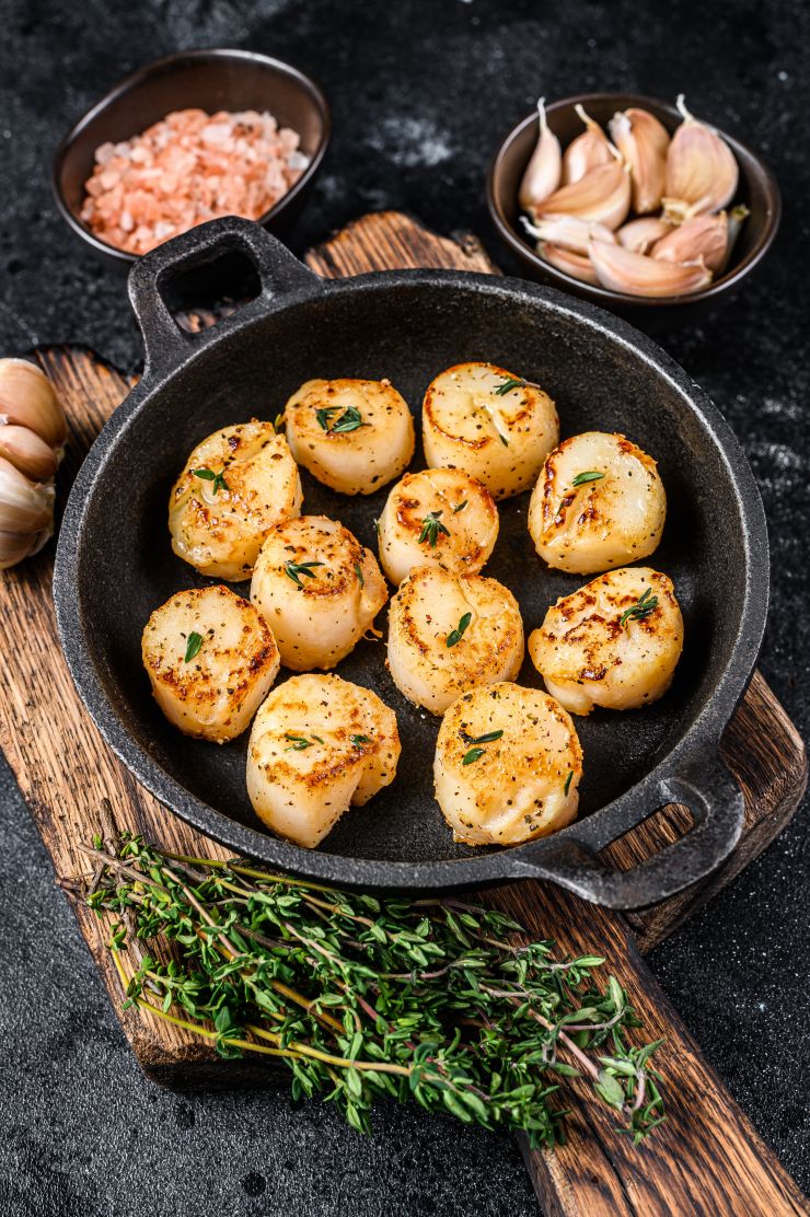 fried-scallops-with-butter-sauce-in-a-pan-black-b-2021-10-21-02-49-53-utc.JPG